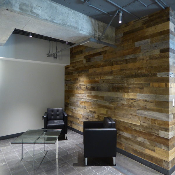 reclaimed barn wood wrapped plank wall